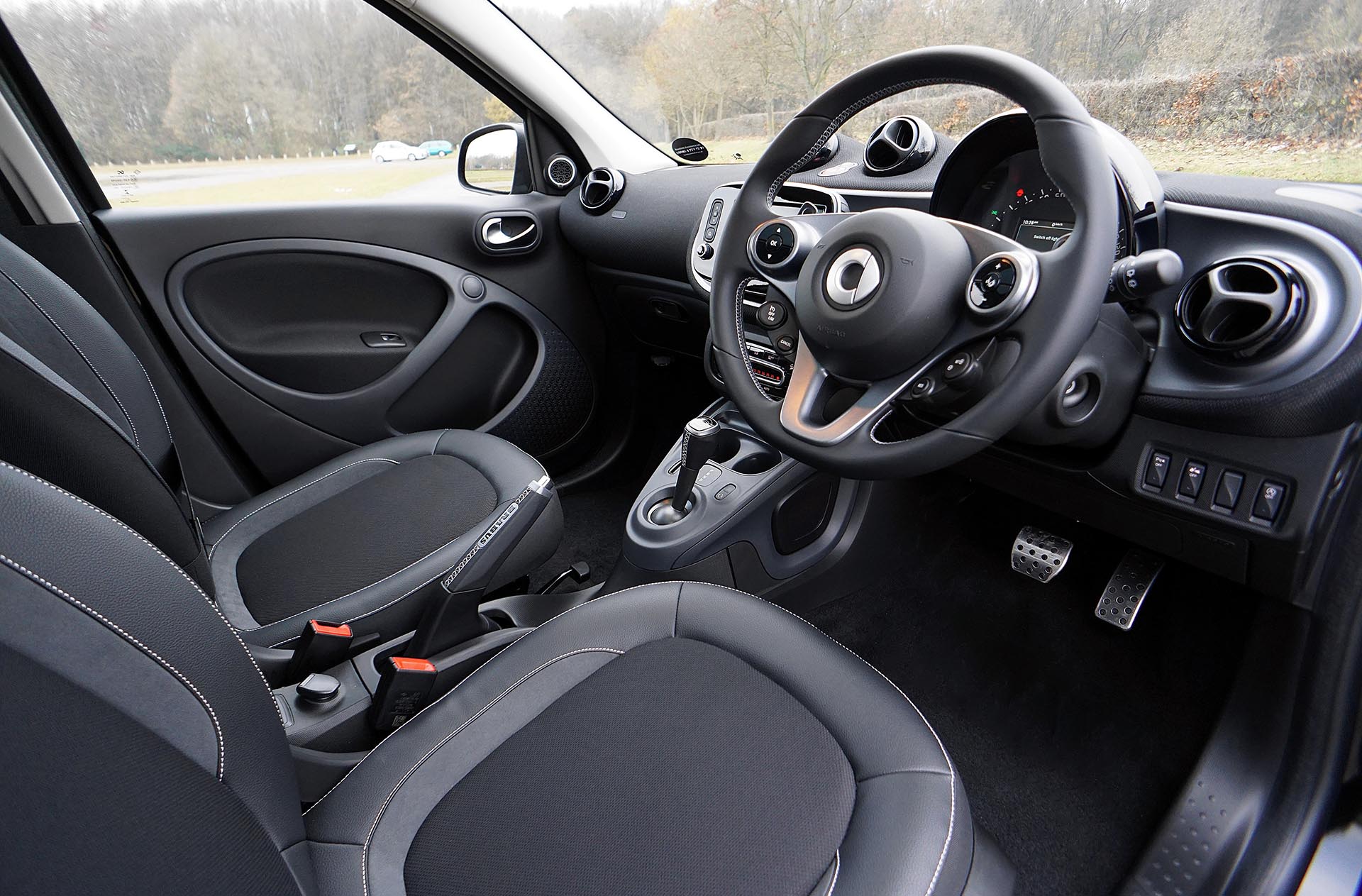 Which countries use vehicles with a right-hand steering wheel